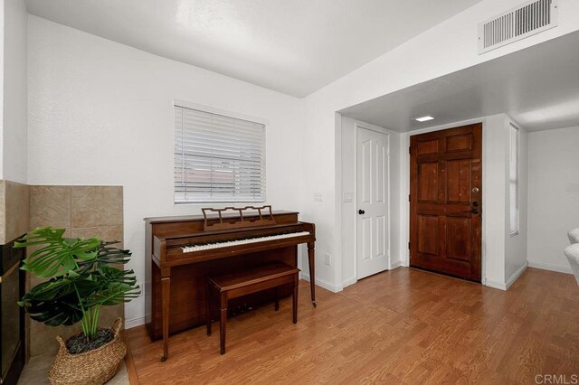 1802 Via Las Palmas Unit 36, National City, CA 91950 - entrance foyer with wood finished floors and baseboards