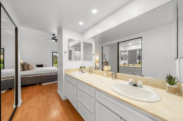 1802 Via Las Palmas Unit 36, National City, CA 91950 - ensuite bathroom featuring double vanity, ceiling fan, wood finished floors, and recessed lighting