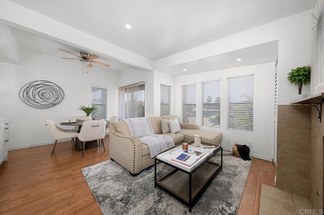 1802 Via Las Palmas Unit 36, National City, CA 91950 - living room with wood finished floors, a ceiling fan, and recessed lighting