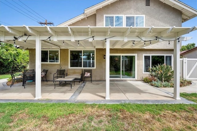 1380 Le Conte, Riverside, CA 92507 - rear view of property featuring stucco siding, a pergola, a gate, and a patio area