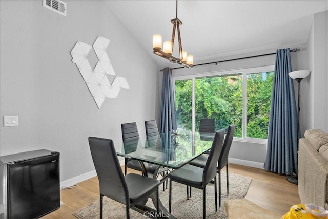 1380 Le Conte, Riverside, CA 92507 - dining area featuring light wood finished floors and lofted ceiling