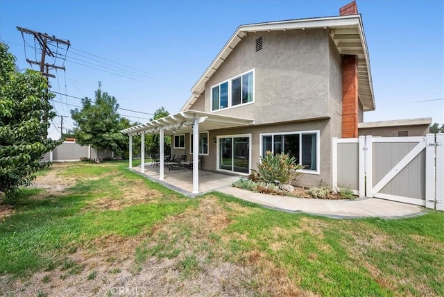 1380 Le Conte, Riverside, CA 92507 - back of house featuring a gate, a pergola, a fenced backyard, a patio area, and stucco siding