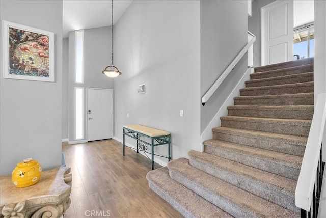 1380 Le Conte, Riverside, CA 92507 - foyer entrance with stairway, wood finished floors, and a towering ceiling