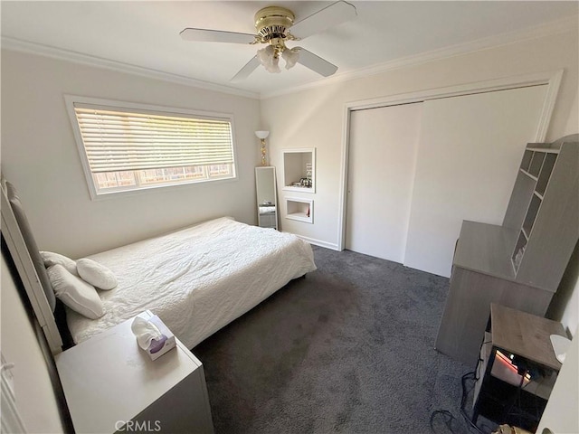 21045 Hemmingway St, Canoga Park, CA 91304 - bedroom with ornamental molding, dark carpet, a closet, and a ceiling fan