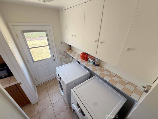 21045 Hemmingway St, Canoga Park, CA 91304 - laundry room featuring washing machine and dryer and cabinet space