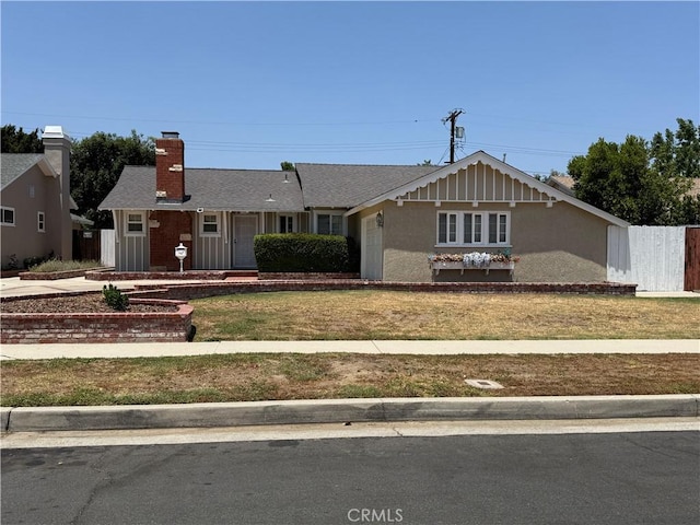 21045 Hemmingway St, Canoga Park, CA 91304 - single story home with a chimney and a front lawn
