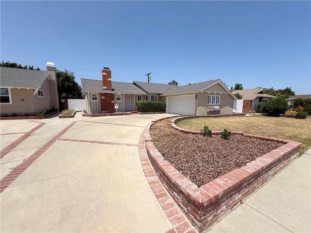 21045 Hemmingway St, Canoga Park, CA 91304 - single story home with driveway, a garage, and a front yard