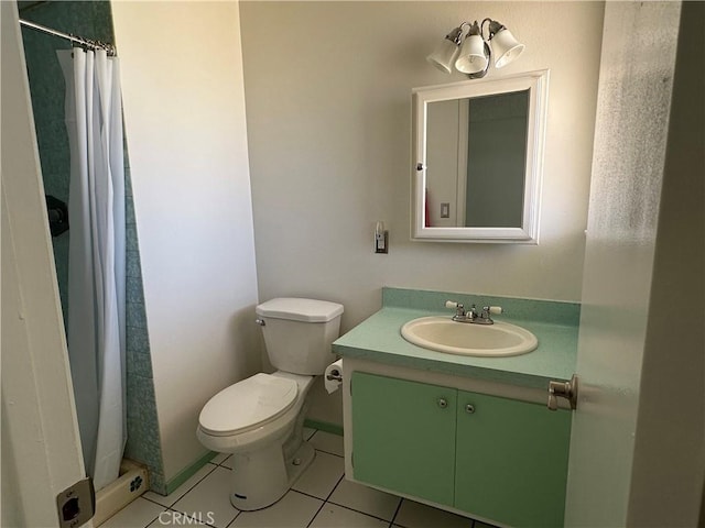 1624 Forane St, Barstow, CA 92311 - bathroom with tile patterned flooring, vanity, and curtained shower
