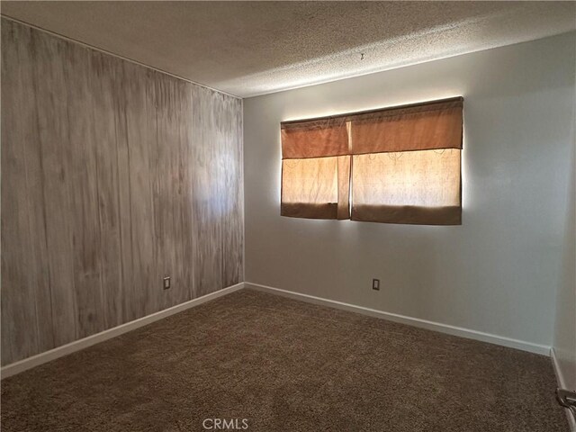 1624 Forane St, Barstow, CA 92311 - unfurnished room featuring carpet flooring and a textured ceiling