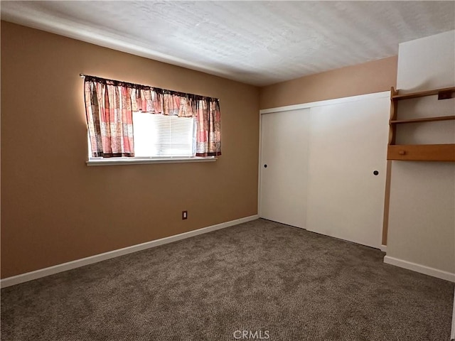 1624 Forane St, Barstow, CA 92311 - unfurnished bedroom featuring carpet floors and a closet