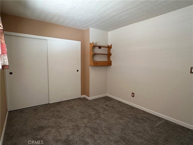 1624 Forane St, Barstow, CA 92311 - unfurnished bedroom with carpet floors and a closet