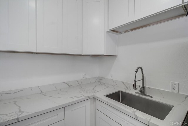 734738 Grand Ave, Spring Valley, CA 91977 - kitchen with white cabinetry and light stone countertops