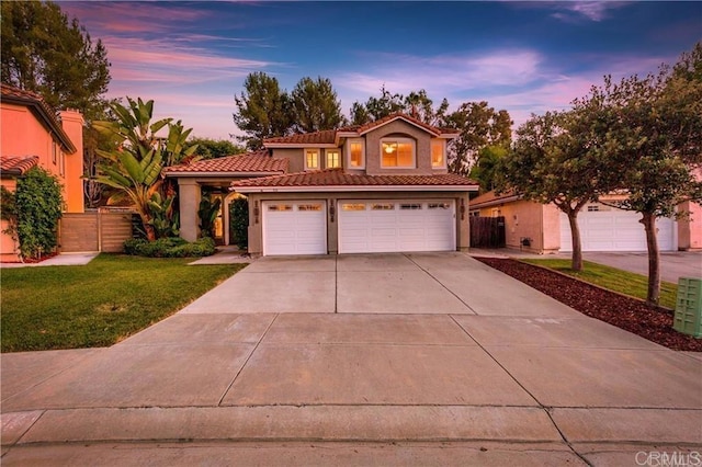 712 Palette Ct, Oceanside, CA 92057 - mediterranean / spanish home featuring concrete driveway, a tile roof, and stucco siding