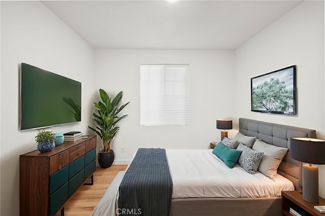 431 Daniella Way, Perris, CA 92570 - bedroom featuring light wood-style flooring and baseboards