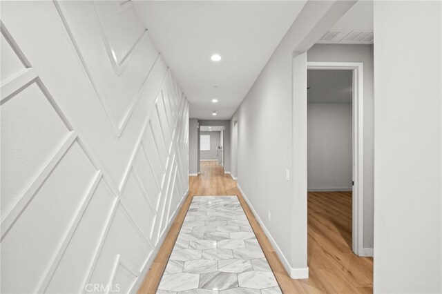 431 Daniella Way, Perris, CA 92570 - hallway with light wood finished floors and recessed lighting