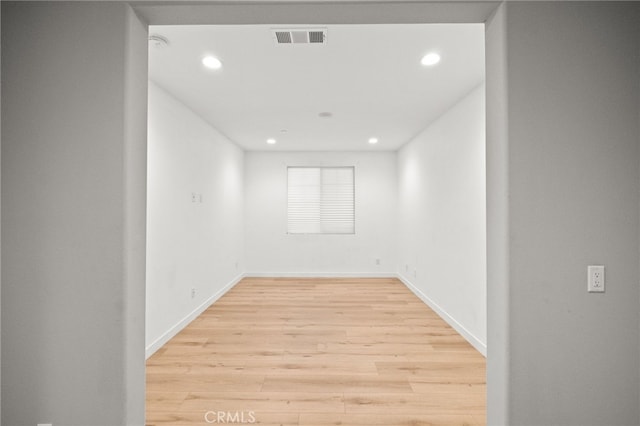 431 Daniella Way, Perris, CA 92570 - spare room with light wood finished floors, recessed lighting, and a smoke detector