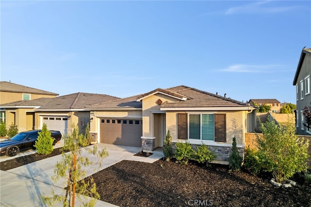 431 Daniella Way, Perris, CA 92570 - ranch-style home with a garage, stone siding, driveway, stucco siding, and a tiled roof