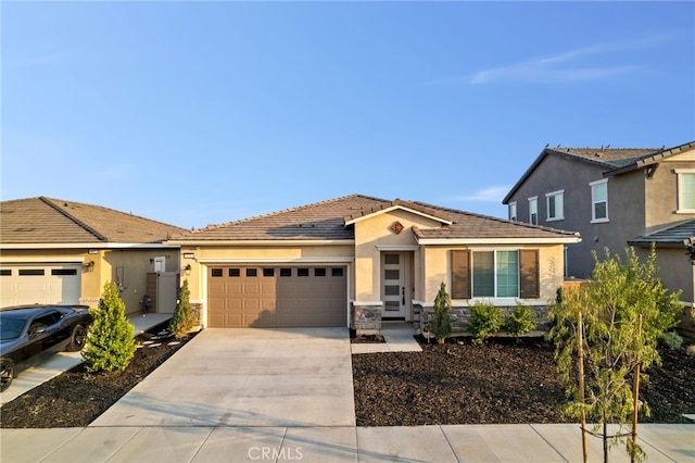 431 Daniella Way, Perris, CA 92570 - single story home featuring a garage, concrete driveway, stucco siding, stone siding, and a tile roof