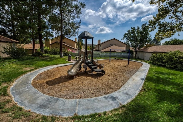 22943 Banyan Pl Unit 306, Saugus, CA 91390 - community play area featuring a lawn