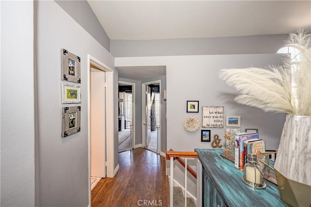 22943 Banyan Pl Unit 306, Saugus, CA 91390 - corridor with dark wood finished floors and baseboards