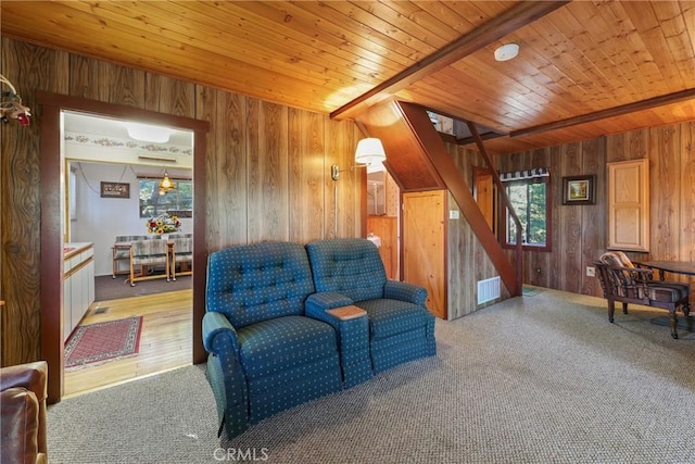 26314 Jacqueline Rd, Twin Peaks, CA 92391 - sitting room with wooden walls, stairs, and a wooden ceiling with exposed beams