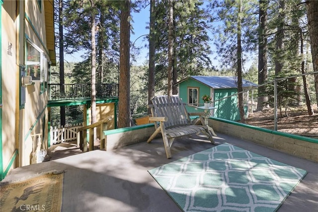 26314 Jacqueline Rd, Twin Peaks, CA 92391 - view of patio / terrace with a storage unit