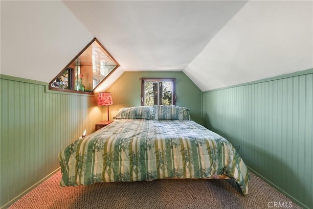 26314 Jacqueline Rd, Twin Peaks, CA 92391 - bedroom with carpet flooring, vaulted ceiling, and wooden walls