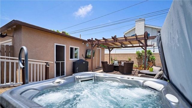 5215 E Monlaco Rd, Long Beach, CA 90808 - view of patio / terrace with a hot tub, a pergola, and an outdoor hangout area
