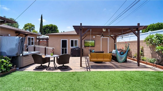 5215 E Monlaco Rd, Long Beach, CA 90808 - back of house with a patio area, stucco siding, an outdoor living space, and a ceiling fan