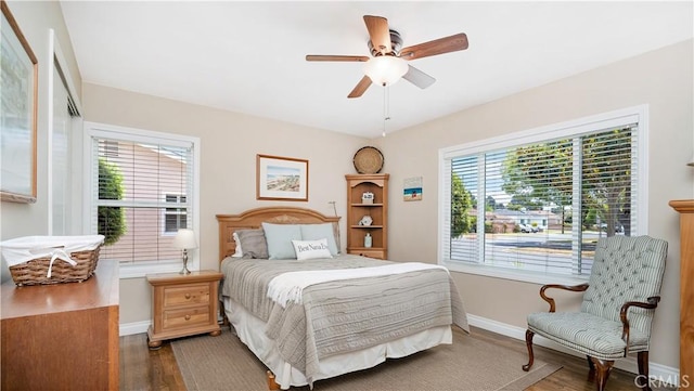 5215 E Monlaco Rd, Long Beach, CA 90808 - bedroom with wood finished floors and a ceiling fan