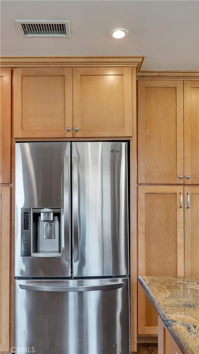 5215 E Monlaco Rd, Long Beach, CA 90808 - detailed view of stainless steel refrigerator with ice dispenser, light stone counters, and recessed lighting
