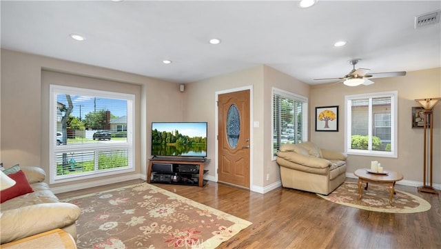 5215 E Monlaco Rd, Long Beach, CA 90808 - living area with wood finished floors, recessed lighting, and a ceiling fan