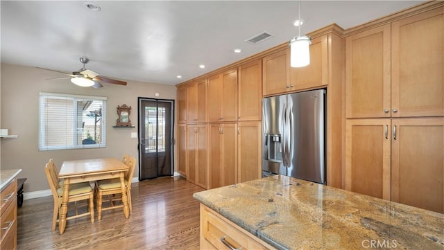 5215 E Monlaco Rd, Long Beach, CA 90808 - kitchen featuring stainless steel refrigerator with ice dispenser, wood finished floors, light stone countertops, ceiling fan, and decorative light fixtures