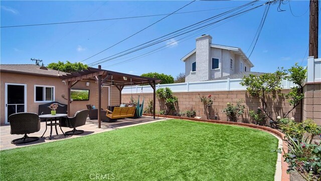 5215 E Monlaco Rd, Long Beach, CA 90808 - fenced backyard featuring an outdoor hangout area, a pergola, and a patio