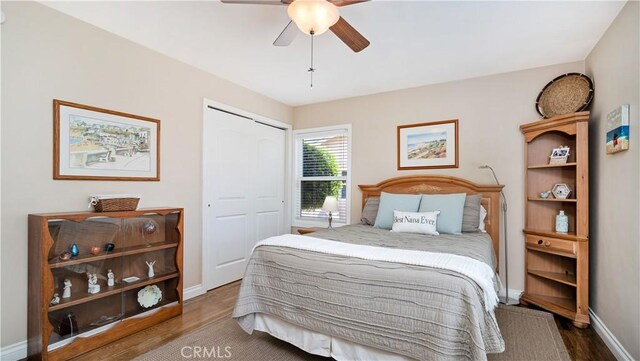 5215 E Monlaco Rd, Long Beach, CA 90808 - bedroom featuring wood finished floors, a closet, and ceiling fan
