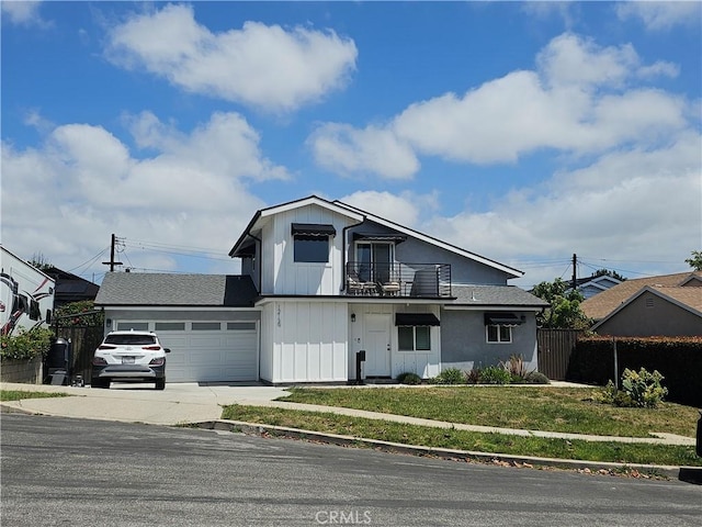 12139 Clarkson Rd, Los Angeles, CA 90064 - modern farmhouse featuring a balcony, an attached garage, concrete driveway, and board and batten siding