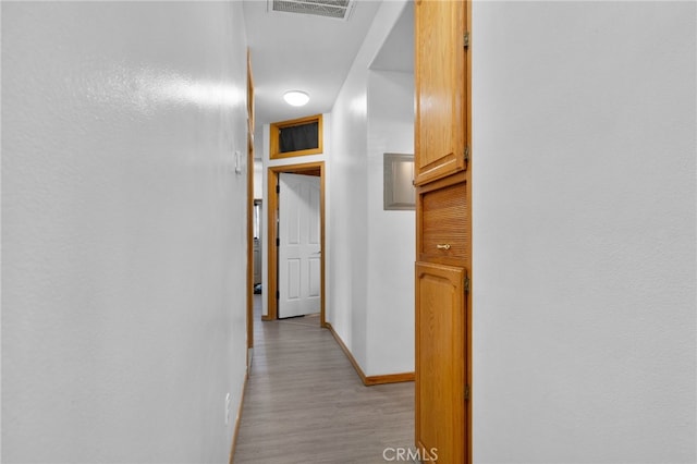 6739 Palm Ave, Riverside, CA 92506 - corridor with baseboards and light wood-style flooring