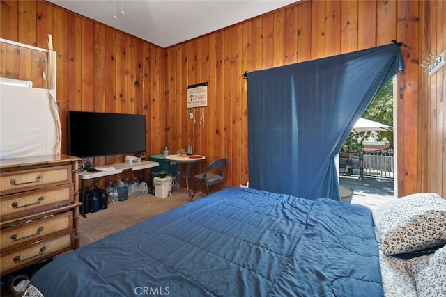 3091 Johnson Ave, San Luis Obispo, CA 93401 - carpeted bedroom featuring wooden walls and access to exterior
