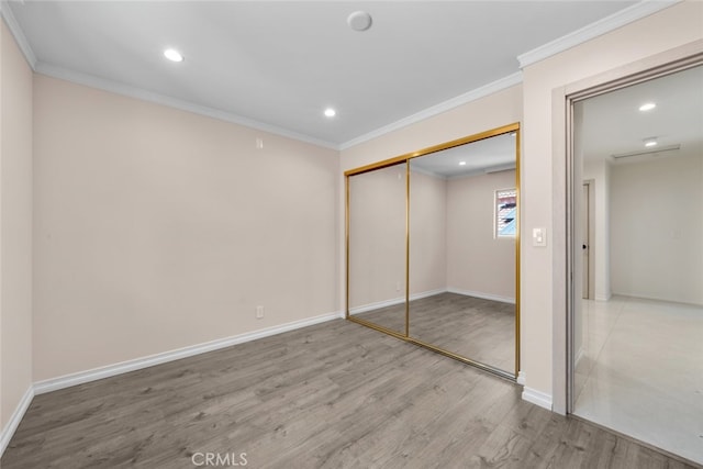 6355 Yolanda Ave, Tarzana, CA 91335 - unfurnished bedroom with wood finished floors, crown molding, recessed lighting, and a closet