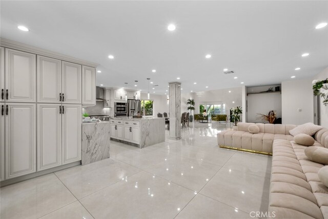 6355 Yolanda Ave, Tarzana, CA 91335 - living area featuring recessed lighting and light tile patterned flooring
