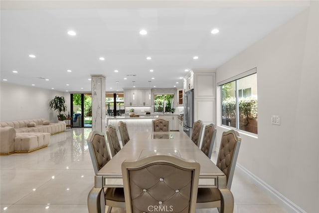 6355 Yolanda Ave, Tarzana, CA 91335 - dining room with recessed lighting, decorative columns, and light tile patterned floors