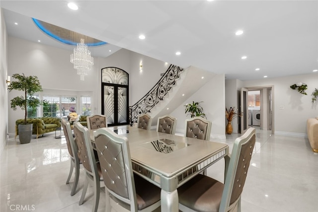 6355 Yolanda Ave, Tarzana, CA 91335 - dining space with light tile patterned flooring, a chandelier, recessed lighting, a high ceiling, and stairs