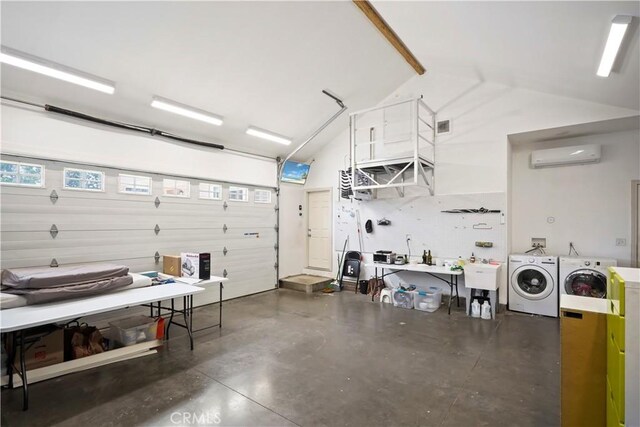 18651 E Weather Rd, Covina, CA 91722 - garage with a wall mounted AC, a workshop area, and washing machine and dryer