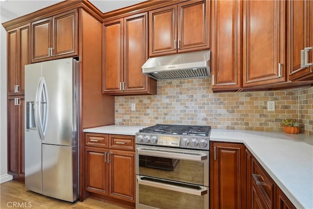 18651 E Weather Rd, Covina, CA 91722 - kitchen featuring stainless steel appliances, under cabinet range hood, light countertops, and decorative backsplash