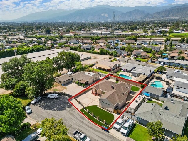 18651 E Weather Rd, Covina, CA 91722 - aerial perspective of suburban area with a mountain backdrop and property parcel outlined