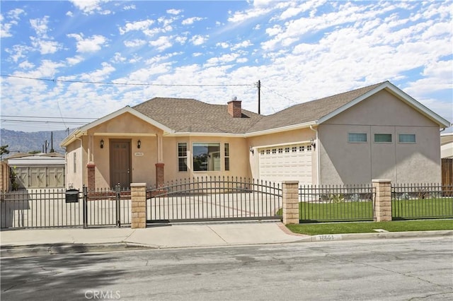 18651 E Weather Rd, Covina, CA 91722 - single story home with stucco siding, a garage, and a fenced front yard