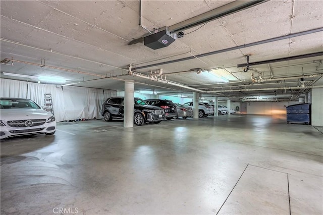 1995 Molino Ave Unit 102, Signal Hill, CA 90755 - parking garage featuring a garage door opener