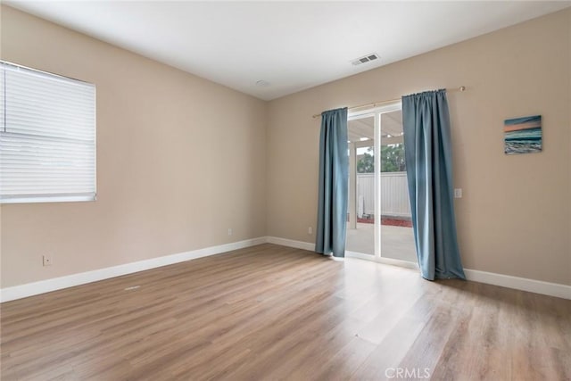 13711 Hidden, Eastvale, CA 92880 - spare room with light wood-style flooring and baseboards