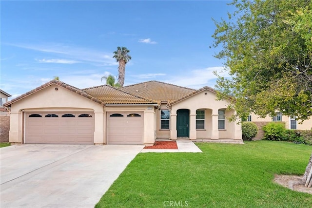 13711 Hidden, Eastvale, CA 92880 - mediterranean / spanish-style house featuring stucco siding, an attached garage, concrete driveway, and a front yard