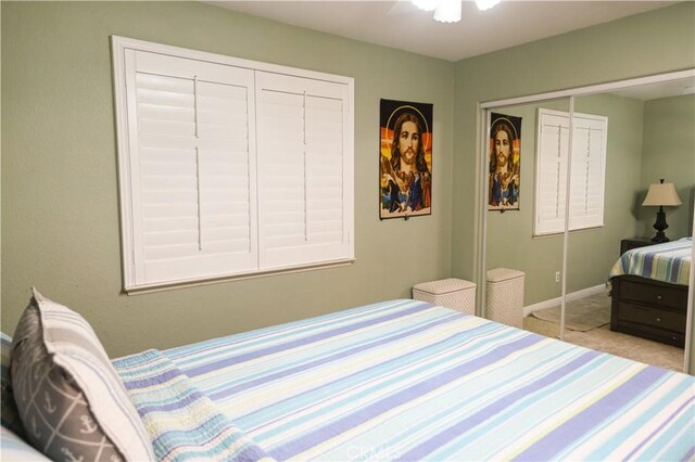 12170 Orgren Ave, Chino, CA 91710 - bedroom featuring carpet, a closet, and ceiling fan